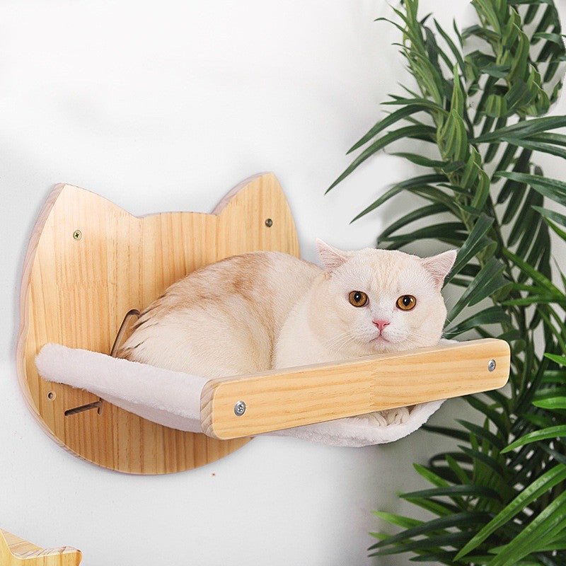 Solid Wood Cat Wall Shelf with a cat lounging comfortably, designed for playful climbing fun.